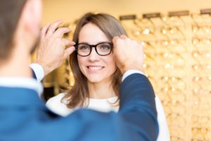 Person trying on glasses
